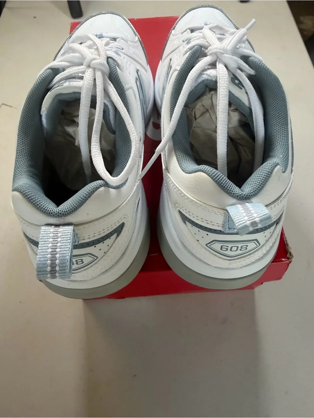 New Balance White and Light Blue Athletic Sneakers